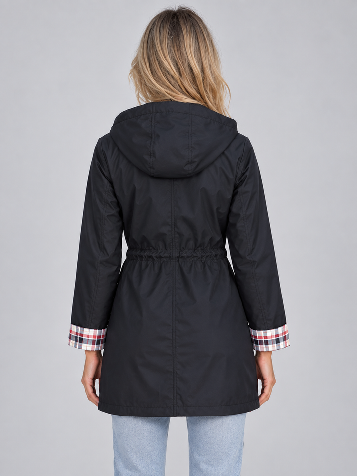 Parka larga antilluvia con capucha