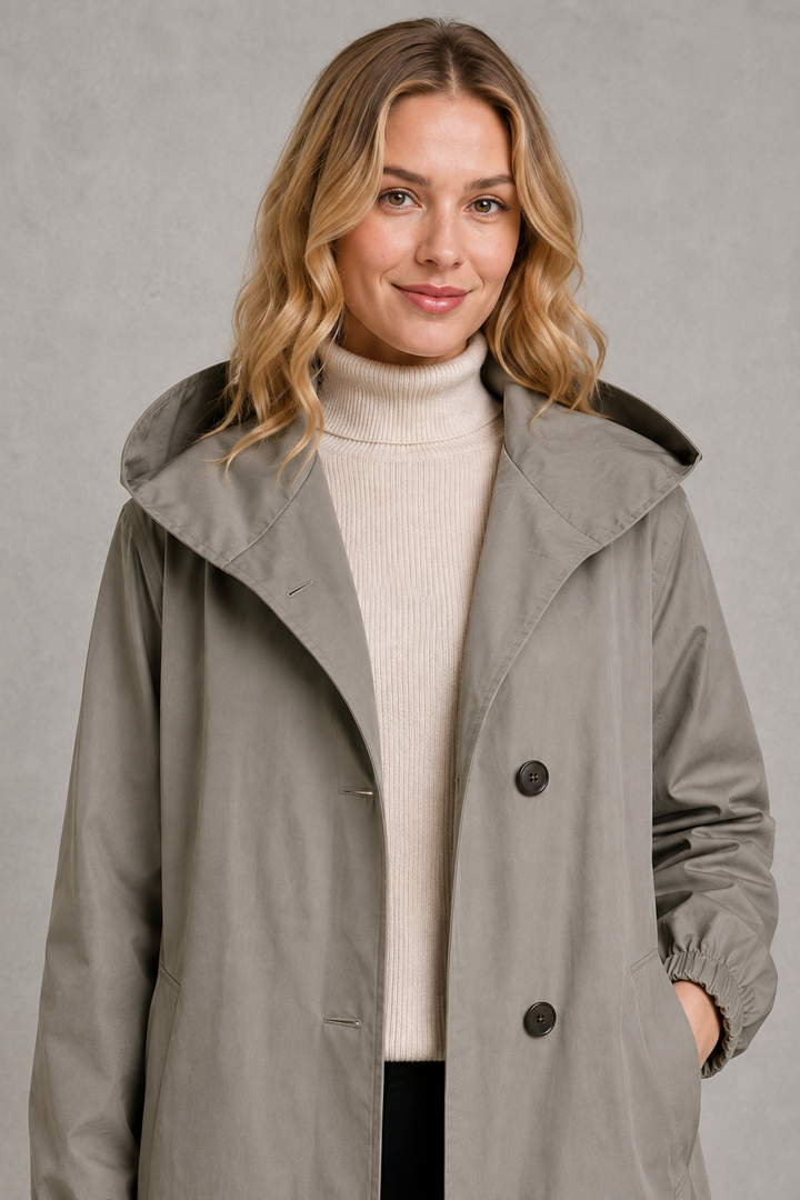 Trench impermeable largo con capucha