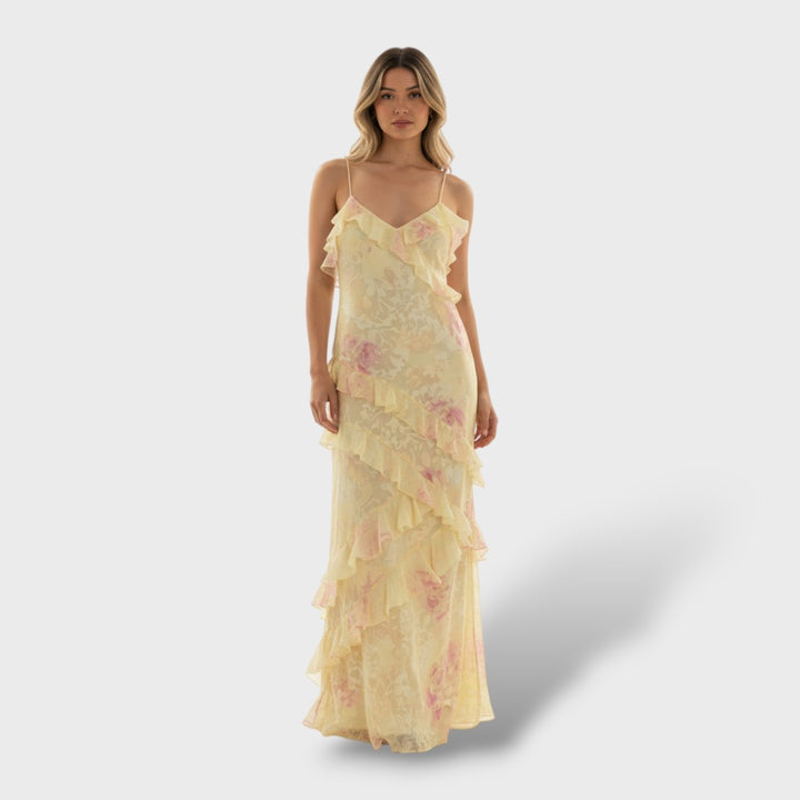 Vestido largo con volantes y espalda abierta